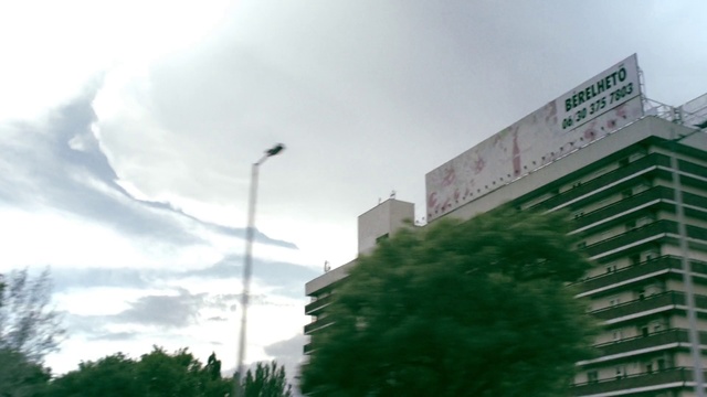 Video Reference: Sky, Green, Daytime, Atmospheric phenomenon, Cloud, Urban area, Architecture, Metropolitan area, Tree, Line