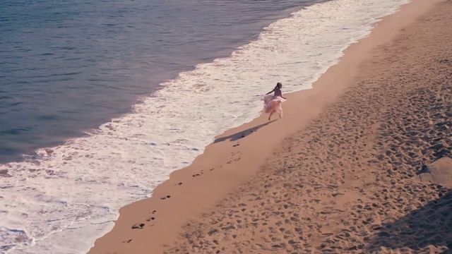 Video Reference: sand, beach, ocean, sea, water, coast, dune, seaside, sandbar, vacation, shore, sky, island, summer, travel, shoreline, tropical, wave
