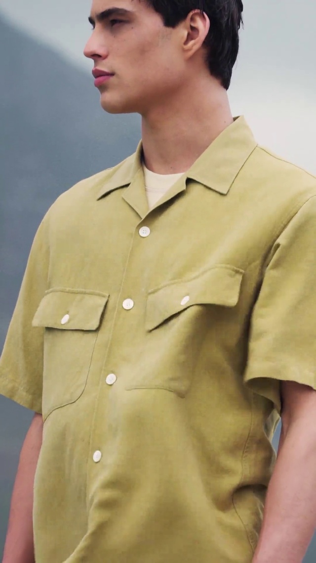Video Reference: Clothing, Sleeve, Collar, Khaki, Uniform, Beige, Military uniform, Shirt, Button, Neck