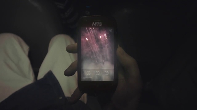 Video Reference: Gadget, Mobile phone, Light, Smartphone, Communication Device, Portable communications device, Hand, Technology, Electronic device, Darkness, Person