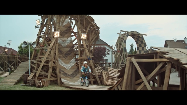 Video Reference: Roller coaster, Amusement ride, Adaptation, Amusement park, Fun, Tree, Recreation, Nonbuilding structure, World, Park, Person