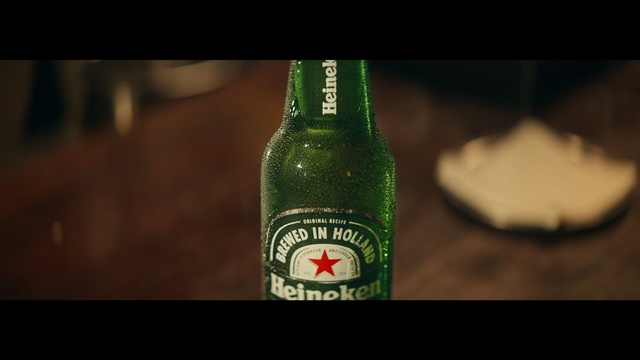 Video Reference: bottle, drink, glass bottle, beer bottle, alcoholic beverage, beer, alcohol, liqueur, lager, pint us, Person