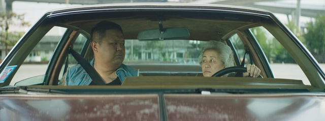 Video Reference: car, motor vehicle, land vehicle, vehicle, family car, automotive design, automotive exterior, classic, city car, vintage car, Person