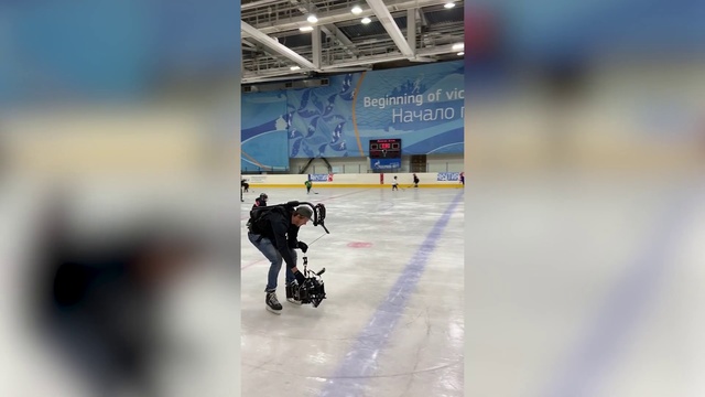 Video Reference: Ice skating, Skating, Ice rink, Winter sport, Recreation, Ice, Sports equipment, Building, Sports, Competition event