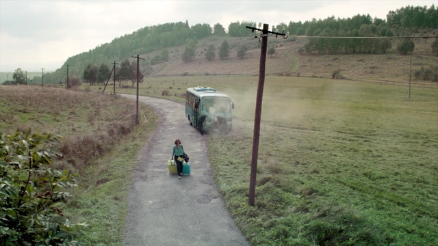 Video Reference: Rural area, Dirt road, Hill station, Road, Land lot, Water, Thoroughfare, Grass, Geological phenomenon, Landscape