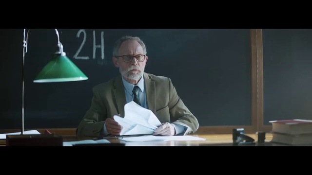 Video Reference: Public speaking, Speech, Sitting, Official, Orator, Professor, Spokesperson, Photography, Eyewear, Photo caption, Person