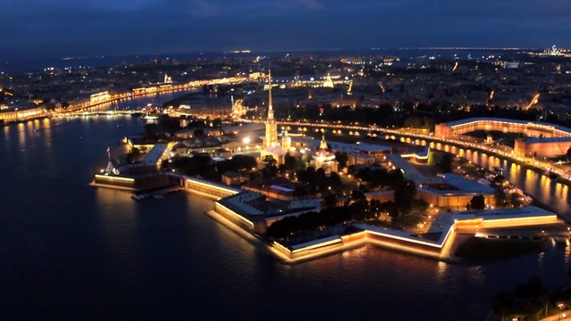 Video Reference: waterway, city, cityscape, night, marina, aerial photography, bird's eye view, metropolis, water resources, fixed link