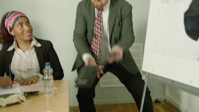 Video Reference: Suit, Shoulder, Joint, Standing, Sitting, Room, Fun, Tie, Outerwear, Formal wear