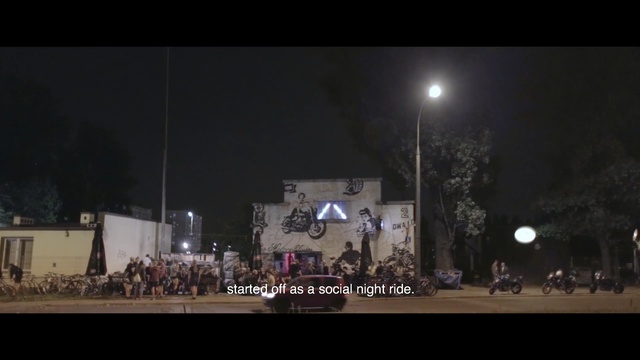 Video Reference: Crowd, Street light, Night, Black, People, Darkness, Light fixture, White, Lighting, Photograph
