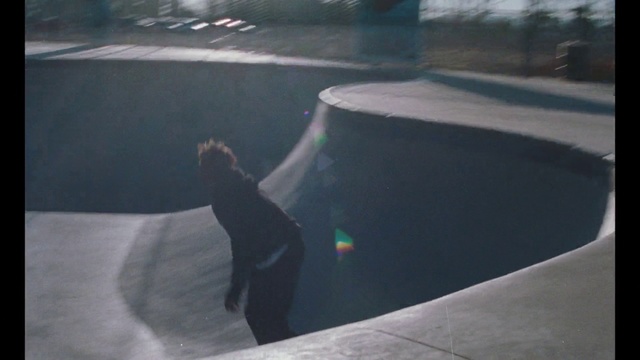 Video Reference: Sport venue, Skatepark, Recreation, Skateboarding, Skateboard, Sports equipment, Concrete, Asphalt, Leisure, Automotive window part