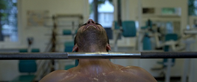 Video Reference: Hair, Hairstyle, Neck, Muscle, Shoulder, Chest, Barechested, Jaw, Sport venue, Back, Person