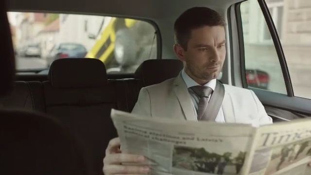 Video Reference: car, vehicle, family car, luxury vehicle, job, automotive exterior, suit, Person