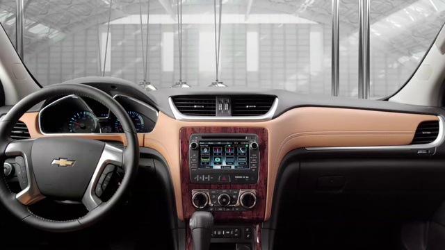 Video Reference: Land vehicle, Car, Vehicle, Motor vehicle, Automotive design, Center console, Technology, Sport utility vehicle, Multimedia, Chevrolet, Person