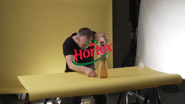 Video Reference: Table, Arm, Design, Furniture, Wood, Interior design, Art, T-shirt, Person