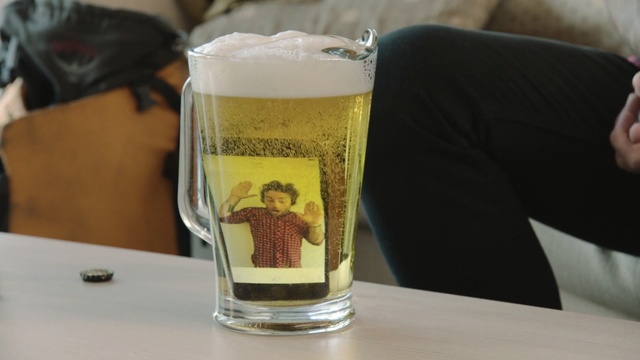 Video Reference: drink, beer, beer glass, alcoholic beverage, pint glass, pint us, beer cocktail, glass, Person