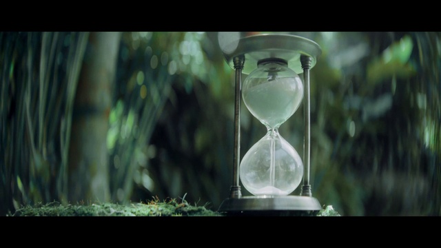 Video Reference: Hourglass, Green, Glass, Water, Measuring instrument, Still life photography, Photography, Transparent material