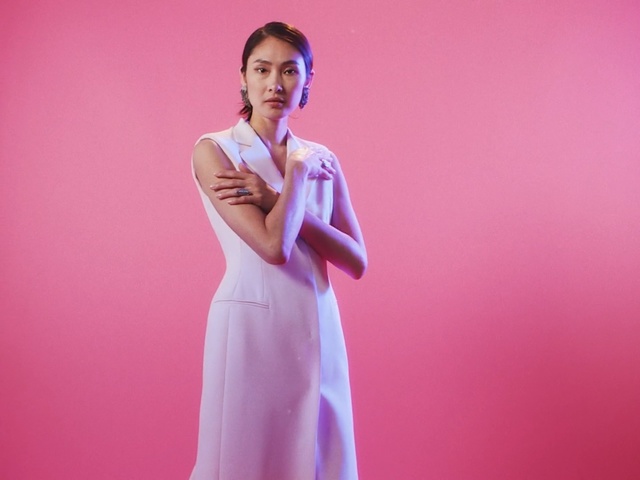 Video Reference: clothing, pink, fashion model, beauty, shoulder, dress, model, fashion, outerwear, photo shoot, Person