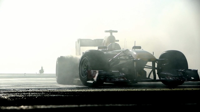 Video Reference: Land vehicle, Vehicle, Formula libre, Race car, Formula one tyres, Automotive tire, Formula one, Tire, Car, Formula one car, Person