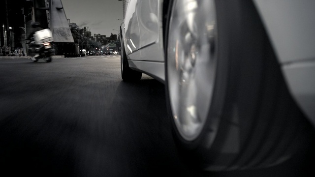 Video Reference: White, Black, Automotive tire, Automotive design, Tire, Wheel, Rim, Automotive lighting, Light, Mode of transport, Person