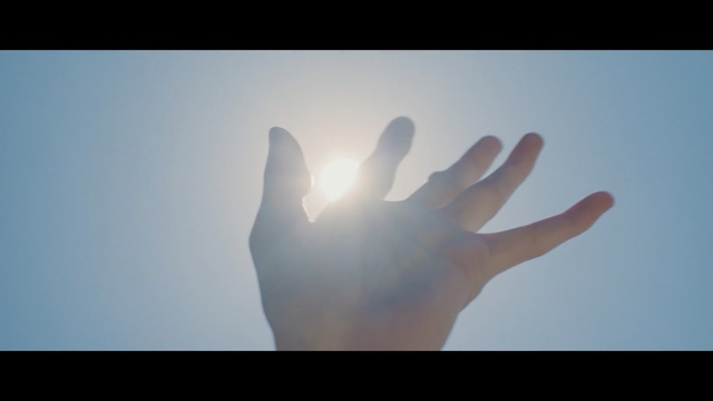 Video Reference: hand, sky, finger, light, atmosphere, daytime, sunlight, arm, thumb, energy