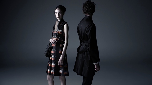 Video Reference: Black, Fashion, Standing, Black-and-white, Dress, Design, Photography, Human, Pattern, Fashion design, Person