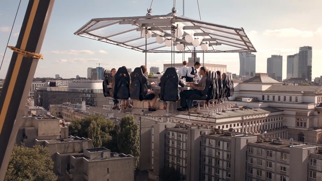 Video Reference: Urban area, Roof, Architecture, City, Building, Metropolis, Urban design, Metal, Person