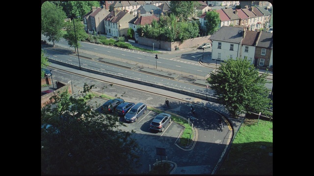 Video Reference: Transport, Mode of transport, Urban design, Urban area, Street, Tree, Landscape, Road, Residential area, Thoroughfare