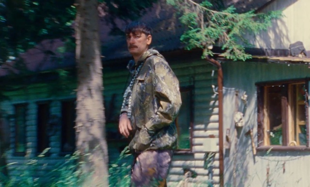 Video Reference: Soldier, Recreation, Tree, Skirmish, Uniform, Games, Outdoor, Building, Man, Person, Holding, Wearing, Front, Standing, Green, Riding, Shirt, Young, Street, Hat, Woman, City, Clothing, Army, Military, Human face