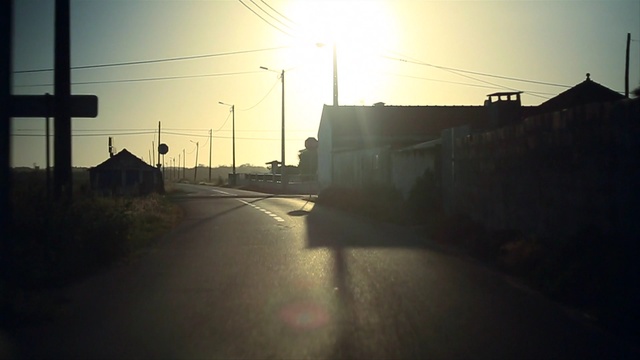 Video Reference: Sky, Atmospheric phenomenon, Morning, Light, Cloud, Road, Asphalt, Atmosphere, Lighting, Mode of transport