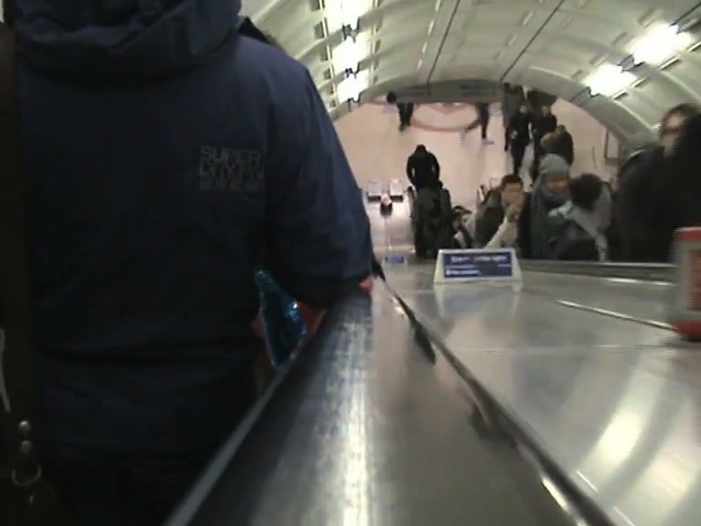 Video Reference: escalator, indoor games and sports, public transport, recreation, fun, sport venue, Person