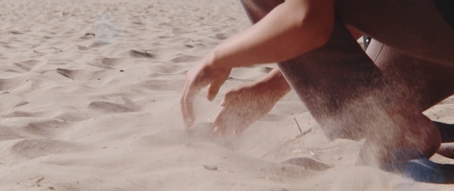 Video Reference: sand, leg, vacation, foot, hand, girl