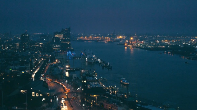 Video Reference: city, cityscape, night, body of water, waterway, metropolitan area, sky, sea, skyline, urban area