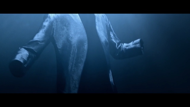 Video Reference: Arm, Darkness, Hand, Photography, Electric blue, Screenshot, Fictional character