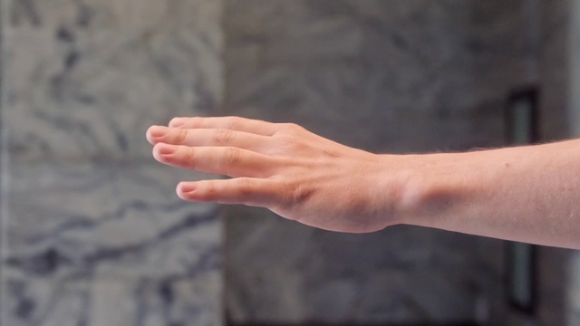 Video Reference: Finger, Hand, Arm, Gesture, Thumb, Nail, Wrist, Person, Building, Indoor, Woman, Using, Holding, Young, Food, Blue, Playing, Red, White