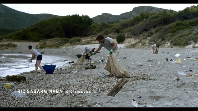 Video Reference: Coast, Water, Beach, Shore, Geological phenomenon, Tourism, Fun, Sand, Waste, Photography, Outdoor, Surfing, Mountain, Man, Board, People, Standing, Woman, Walking, Holding, Young, Sandy, White, Ocean, Group, Playing, Suit, Doing, Laying, Person, Clothing