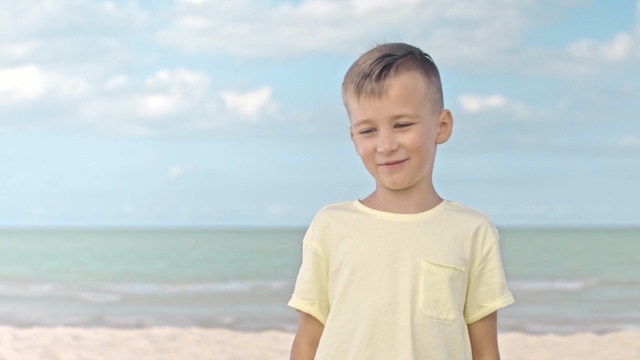 Video Reference: Child, Vacation, Summer, Sky, Male, Ocean, Sea, Fun, Human, Smile, Person