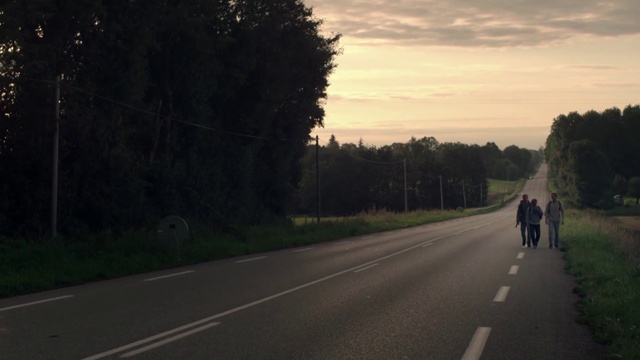 Video Reference: Road, Sky, Atmospheric phenomenon, Lane, Morning, Asphalt, Natural landscape, Highway, Light, Tree, Person