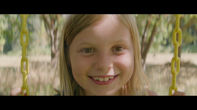 Video Reference: hair, face, skin, facial expression, child, green, smile, nose, human hair color, beauty, Person