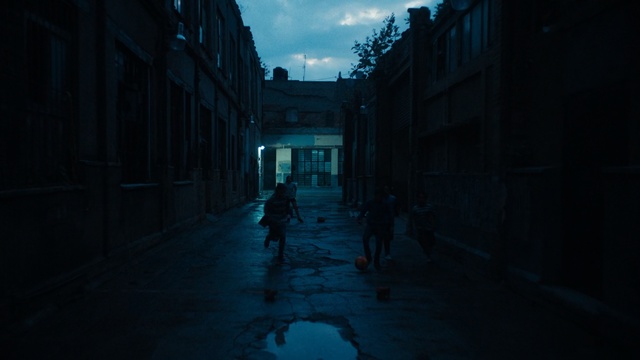 Video Reference: Blue, Sky, Street, Darkness, Light, Town, Urban area, Water, Atmosphere, Night, Person