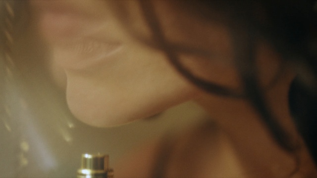 Video Reference: nose, girl, light, close up, chin, cheek, lip, hand, lighting, mouth