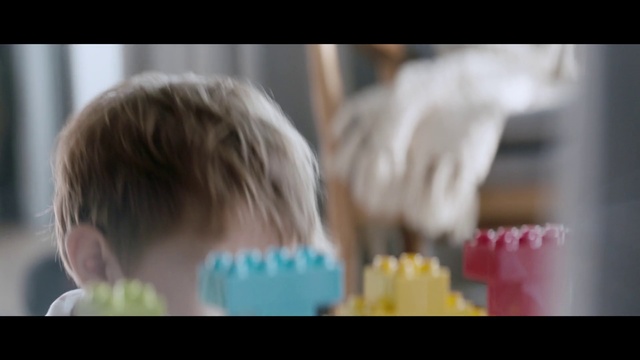 Video Reference: Hair, Child, Face, Hairstyle, Toddler, Skin, Head, Tooth, Blond, Cheek