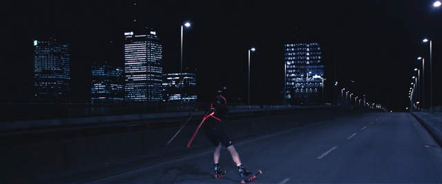 Video Reference: Roller skating, Footwear, Roller skates, Night, City, Sky, Human settlement, Recreation, Skating, Roller sport