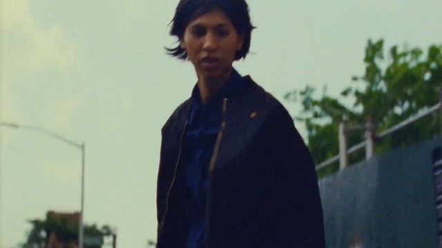 Video Reference: Outerwear, Smile, Adaptation, Photography, Black hair, Person