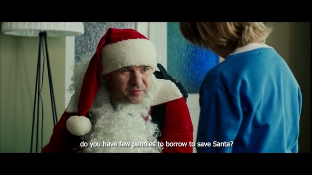 Video Reference: Santa claus, Christmas, Fictional character, Tradition, Smile, Headgear, Holiday, Event, Facial hair, Photo caption, Person