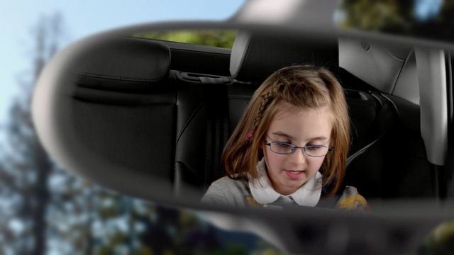 Video Reference: car, photography, girl, automotive design, smile, vehicle, electronic device, technology, audio equipment, audio, Person