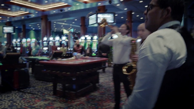 Video Reference: casino, indoor games and sports, bar, recreation, Person