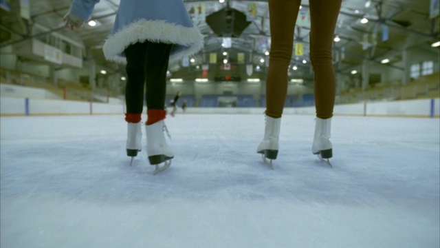 Video Reference: Ice rink, Ice skating, Ice skate, Skating, Ice, Recreation, Winter, Freezing, Building, Sports equipment, Person