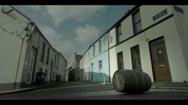 Video Reference: Sky, Automotive tire, Tire, Architecture, Urban area, Town, Street, House, Building, Photography, Person