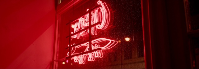 Video Reference: Red, Neon sign, Neon, Electronic signage, Text, Font, Signage, Display advertising, Advertising, Building