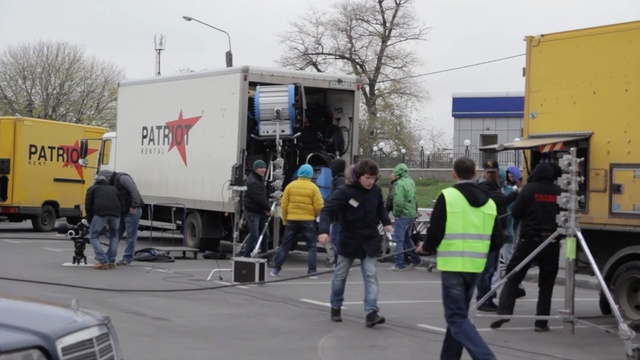 Video Reference: vehicle, transport, mode of transport, motor vehicle, asphalt, pedestrian, car, street, Person